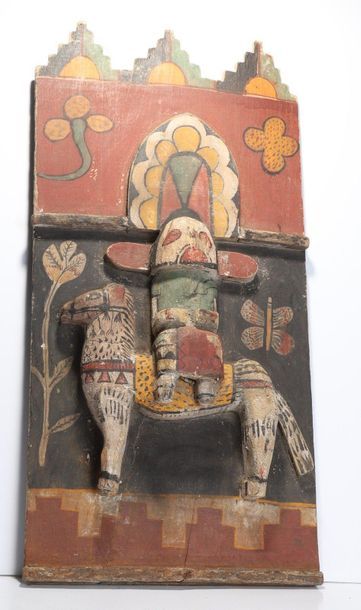 Decorative doll represented on a horse, made...