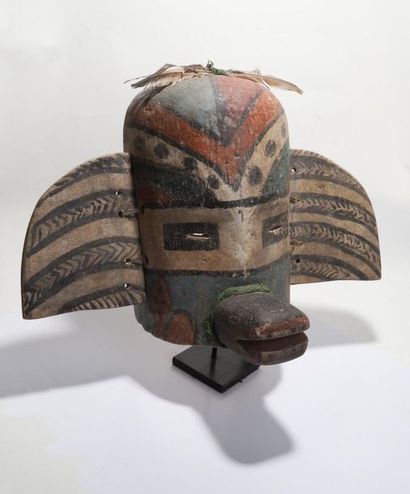Anthropozoomorphic decorative mask with two...