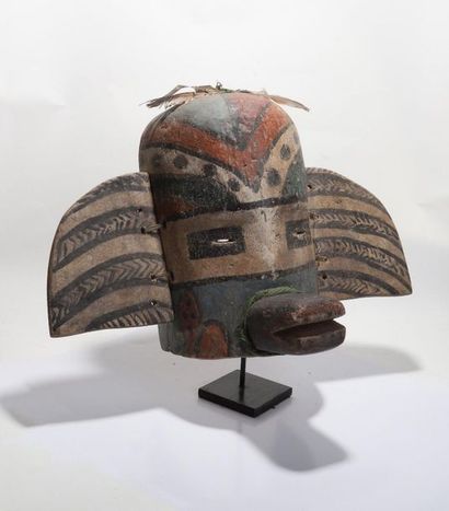 Anthropozoomorphic decorative mask with two...