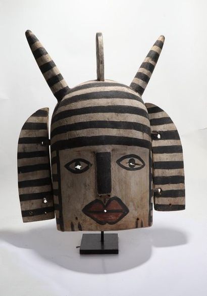 Anthropomorphic decorative mask with a face...