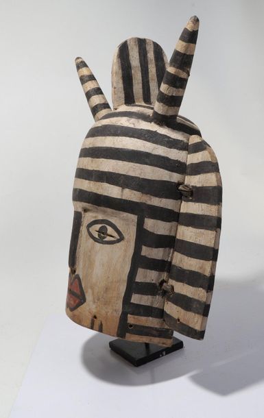 Anthropomorphic decorative mask with a face...