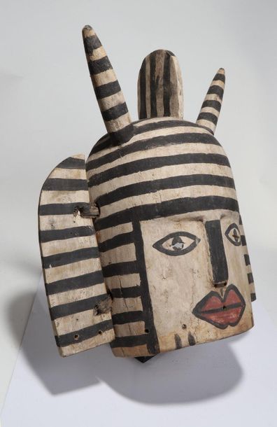 Anthropomorphic decorative mask with a face...