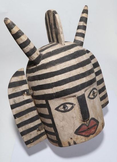 Anthropomorphic decorative mask with a face...