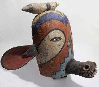 Anthropozoomorphic decorative mask with two...