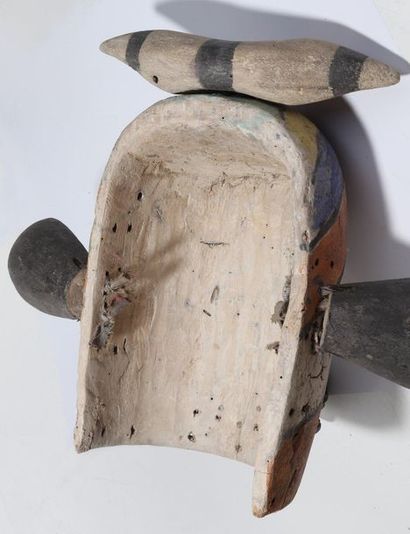 Anthropozoomorphic decorative mask with two...