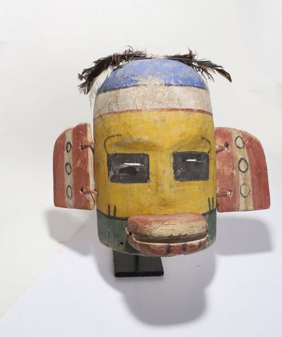 Anthropozoomorphic decorative mask with two...