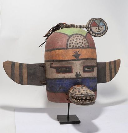 Anthropozoomorphic decorative mask with two...