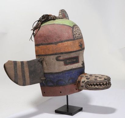 Anthropozoomorphic decorative mask with two...
