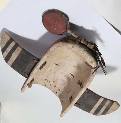 Anthropozoomorphic decorative mask with two...