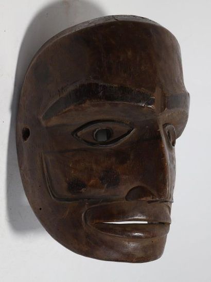 Anthropomorphic decorative mask with a face...