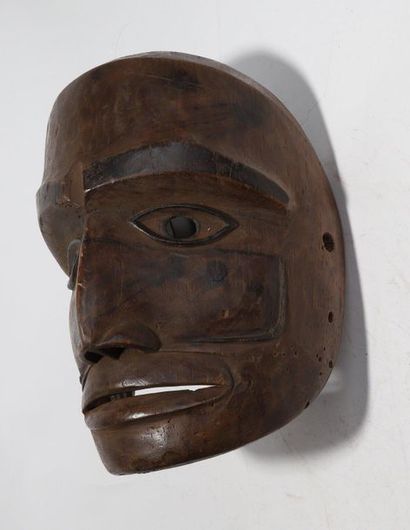 Anthropomorphic decorative mask with a face...