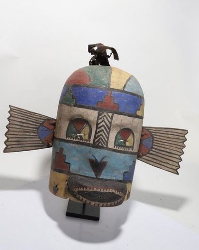 Anthropozoomorphic decorative mask with two...