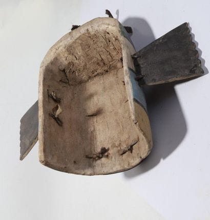 Anthropozoomorphic decorative mask with two...