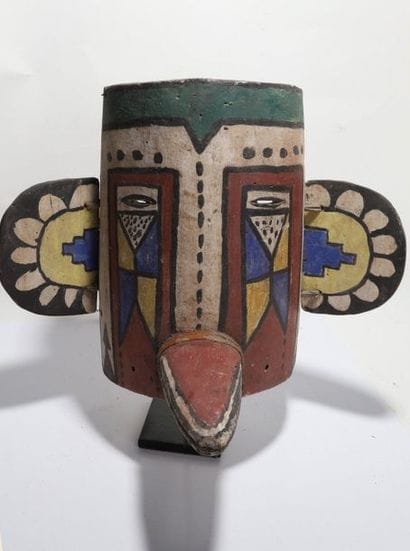 Anthropozoomorphic decorative mask with two...