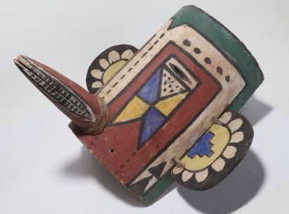 Anthropozoomorphic decorative mask with two...