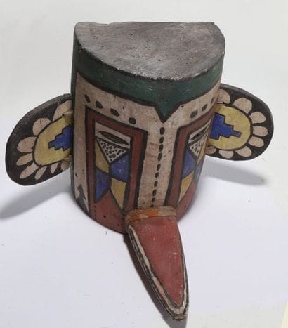Anthropozoomorphic decorative mask with two...