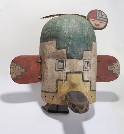 Anthropozoomorphic decorative mask with a...