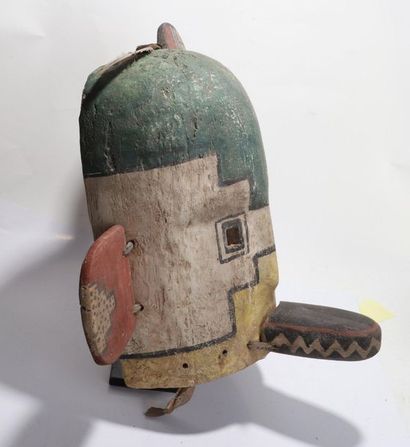 Anthropozoomorphic decorative mask with a...