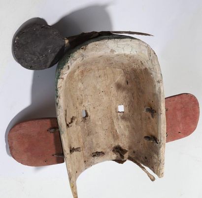 Anthropozoomorphic decorative mask with a...