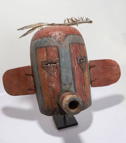Anthropozoomorphic decorative mask with a...