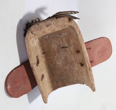 Anthropozoomorphic decorative mask with a...