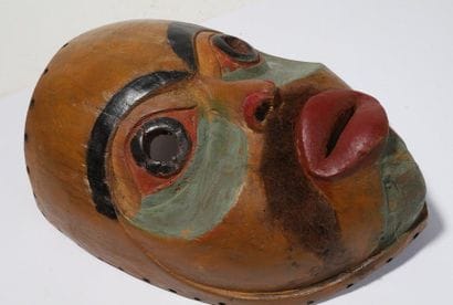 Decorative anthropomorphic mask with an open...