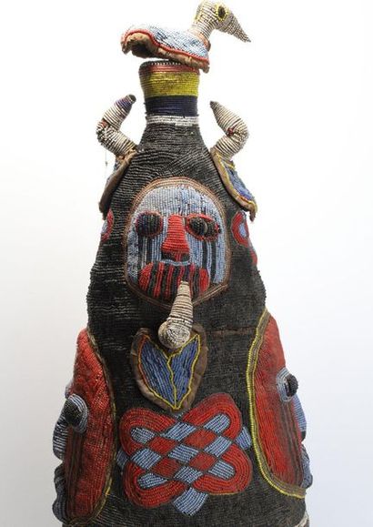 Fully beaded Ade headdress with faces, geometric...