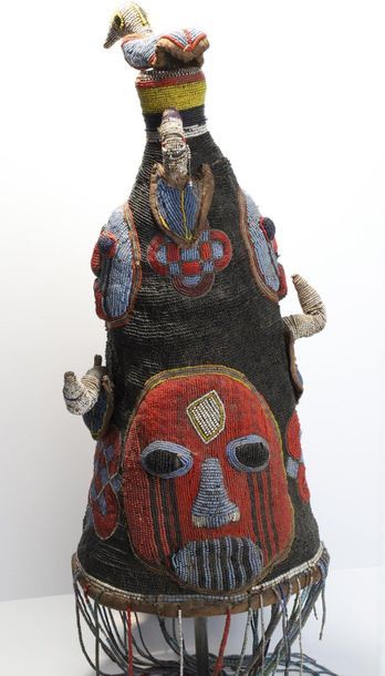 Fully beaded Ade headdress with faces, geometric...