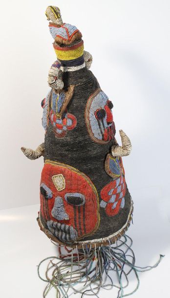 Fully beaded Ade headdress with faces, geometric...