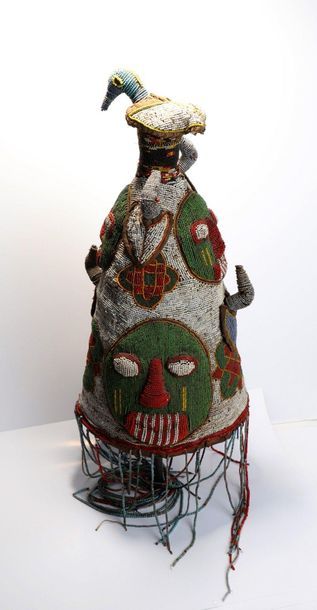 Fully beaded Ade headdress with faces, geometric...