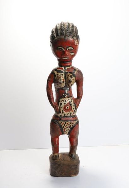 Statuette of a colonist showing a woman in...