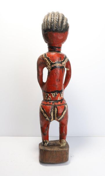 Statuette of a colonist showing a woman in...