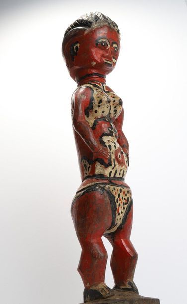 Statuette of a colonist showing a woman in...