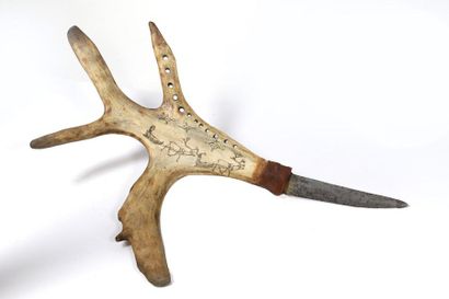 Knife with a slightly curved blade, the handle...