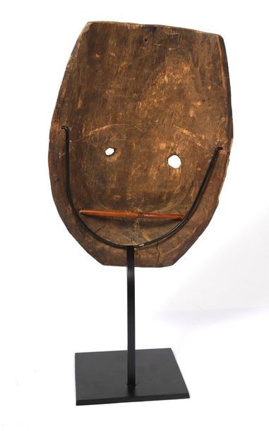 Wooden mask with a polychrome patina and...