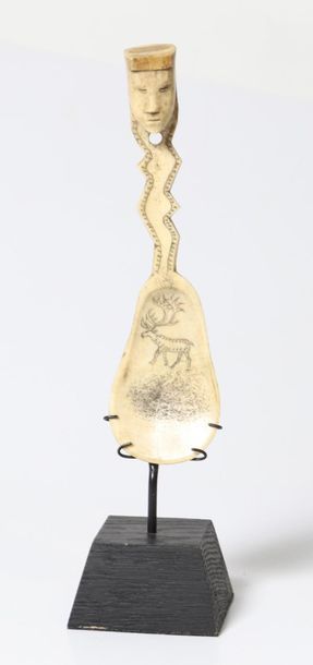 Bone spoon engraved with a deer design in...