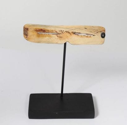 Rectangular bone eyeglasses.

Inuit, Esk...