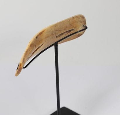 Rectangular bone eyeglasses.

Inuit, Esk...