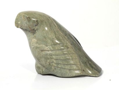 Bird in carved green hard stone, signed under...