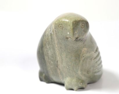 Bird in carved green hard stone, signed under...