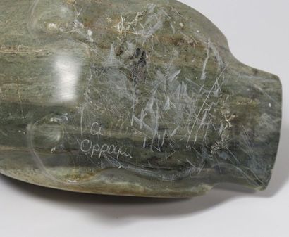 Bird in carved green hard stone, signed under...