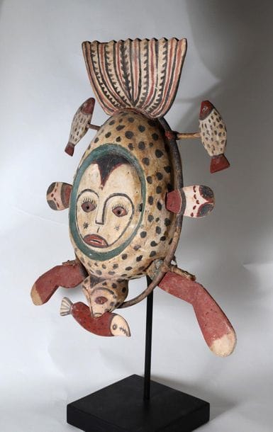 Anthropozoomorphic decorative mask with an...