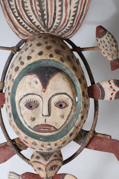 Anthropozoomorphic decorative mask with an...