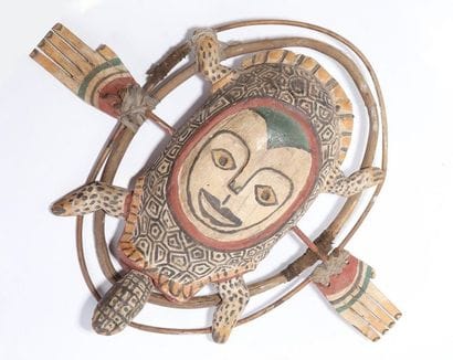 Anthropozoomorphic decorative mask with an...