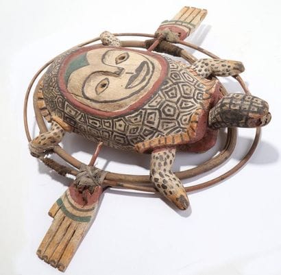 Anthropozoomorphic decorative mask with an...