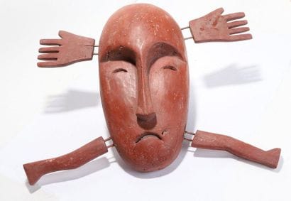 Anthropomorphic decorative mask with an oval...