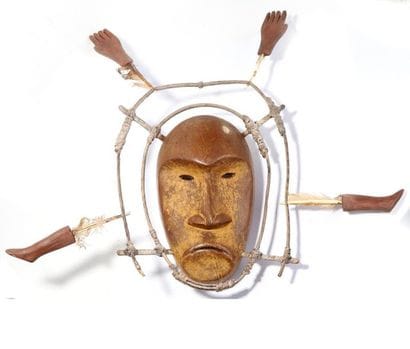 Anthropomorphic decorative mask with an oval...