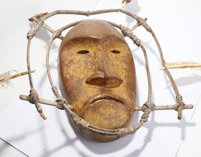 Anthropomorphic decorative mask with an oval...