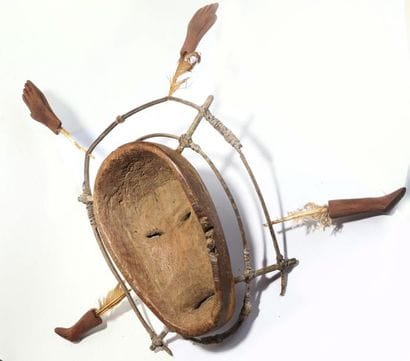 Anthropomorphic decorative mask with an oval...
