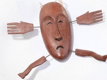 Anthropomorphic decorative mask with an oval...
